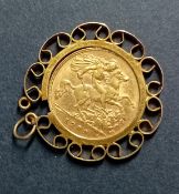 An Edward VII Half Sovereign, 1909, mounted on a pendant, approx 6g.