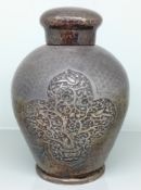 A Chinese silver tea caddy, with overall hammered design and tree of life decoration in a pointed