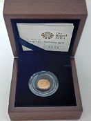 A Quarter-Sovereign Royal Mint gold proof coin, boxed, with certificate of authenticity.