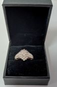 A diamond fancy set cluster ring, 9ct white and yellow gold set. Finger size P, 4.9 grams.