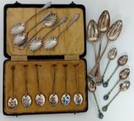 A quantity of 19 various silver spoons to include a set of five enamelled with floral detail to