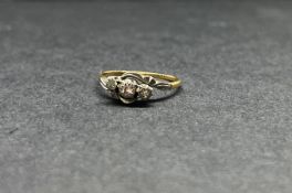 An 18ct yellow gold diamond ring, approx 2.11g.