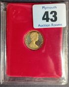 A 1979 Isle of Man Half Sovereign Pobjoy mint.