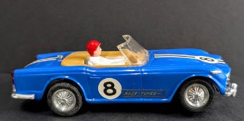 Scalextric, C84- 'Triumph TR4/A', 1/24 scale, model slot car, unboxed, with 2 'Scalextric Racer'