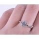 An 18ct white gold ring set with a central emerald cut aquamarine, approx. 0.50 carats, surrounded - Image 2 of 2