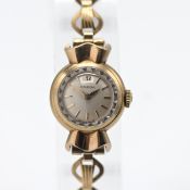 Omega, a 9ct yellow gold ladies cocktail 'Sweetheart' wristwatch, total weight approx 12.4g.