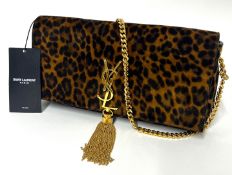 Yves Saint Laurent, a suede leopard print Monogram tassel Kate handbag, with shoulder strap,