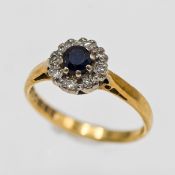 An 18ct yellow gold sapphire and diamond ring, approx 2.7g, size L.