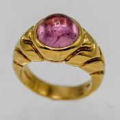 BVLGARI, an 18ct yellow gold ring, set with a pink gem stone, approx 12.4g, size M.