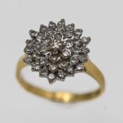 An 18ct diamond cluster ring, approx 3.8g, size I/J.