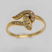 An unusual gold and diamond set 'Snake' ring (not hallmarked), possibly 18ct, approx 3.2g, size R.