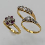 Three diamond rings set in 18ct yellow gold, approx 8g.