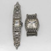 Two platinum and diamond ladies cocktail watches (lacks bracelet) approx 28g.