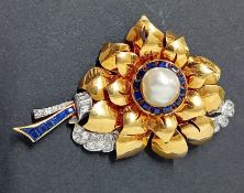 An impressive Art Deco style Flower Brooch, set with various cut diamonds, a baroque pearl and cut