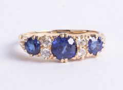 An antique 18ct diamond and sapphire ring, size J.