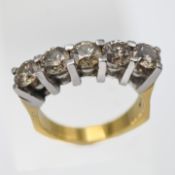 A diamond half hoop ring, set with five brilliant cut diamonds in claw settings. marked 18k.