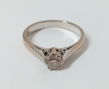 A diamond solitaire ring set in 18ct white gold, approx 0.40 carats, size N.