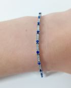 An 18ct white gold diamond and sapphire bracelet, approx 18.5cm, approx 12.56g.