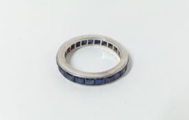 A white gold sapphire full eternity ring, size N.