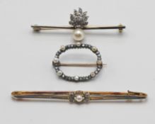 Three pearl and diamond brooches, approx 9.5g.