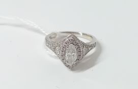 An 18ct white gold diamond cluster style ring, set with 94 round brilliant cut diamonds gauging 1.
