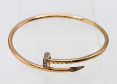 Cartier, a ladies 18ct rose gold 'Juste Un Clov' diamond set bangle, approx 19.5g, with copy of a
