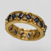 A sapphire and diamond full eternity band ring, set in 18ct yellow gold, approx 5.9g, size K/L.