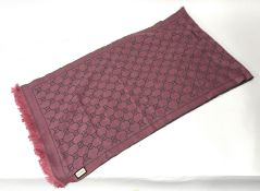 Gucci, a pink GG logo wool scarf, with label tag, original receipt purchased 2020 for £230.00 (label