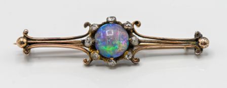 A black opal and diamond set brooch (not hallmarked), approx 4.7g.