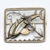 GEORG JENSEN; a Hawaii dolphin brooch, circa 1950, designed by Arno Malinowski, marked 251 to the
