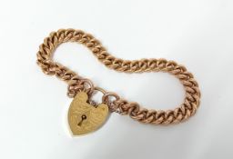 A 9ct gold link bracelet with heart padlock, approx 27.2g