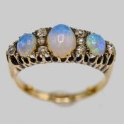 A good opal and diamond ring set in 18ct yellow gold, approx 6.2g, size Q/R.