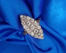 A good diamond cluster ring of marquise shape, set in yellow gold, size R.