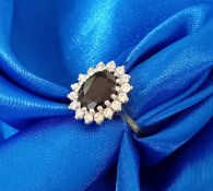 An 18ct yellow gold diamond and sapphire cluster ring, approx 4.9g.