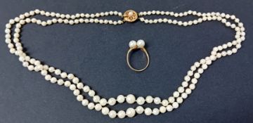 A double row pearl necklace set with a 9ct gold clasp together with a 9ct gold pearl ring.