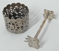 A Chinese silver mustard pot holder (SM) and a single knife rest (2). 1.48oz. Please see