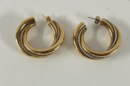 A pair of small hoop back diamond set earrings with screw back setting, height 39mm, 12.90g.