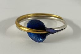 Blue Wing Gallery, a silver and yellow metal flower design bangle, boxed.