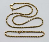 A 9ct yellow gold link necklace and matching bracelet, 18g.