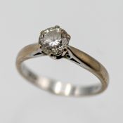 A diamond solitaire ring. Set with a round brilliant cut Diamond, estimated weight 1.00ct, white