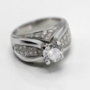 A fine 18ct diamond ring, set with a central round cut diamond , approximately 1.80 / 2.00 carats,