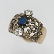 A diamond and sapphire three stone ring, set in 18ct white gold, hallmarked Birmingham 1996,