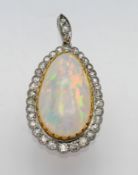 A diamond and opal 'pear' shape drop pendant, approx 3.2g