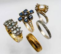 Five various gem-set dress rings, not hallmarked.