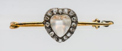 A moonstone and diamond 'heart' shaped brooch, set in yellow metal, approx 2.9g (not hallmarked).