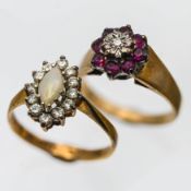 An opal and diamond dress ring, set in 9ct gold together with a ruby and diamond dress ring, set