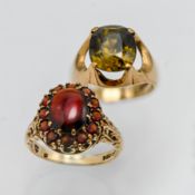 A 9ct garnet cluster ring together with a 9ct single stone Citrine (light green) ring in floral