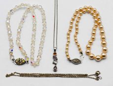 A silver pendant set with coloured gem stones together with a pearl necklace etc.
