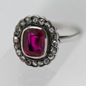 A diamond and red stone cluster ring, set in 18ct white gold, head size 14mm x 12mm, approx 4.3g,