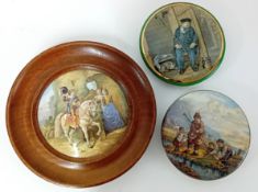 Three Pratt ware pot lids, one mounted into a frame, decorated with 18th century style pictures. (